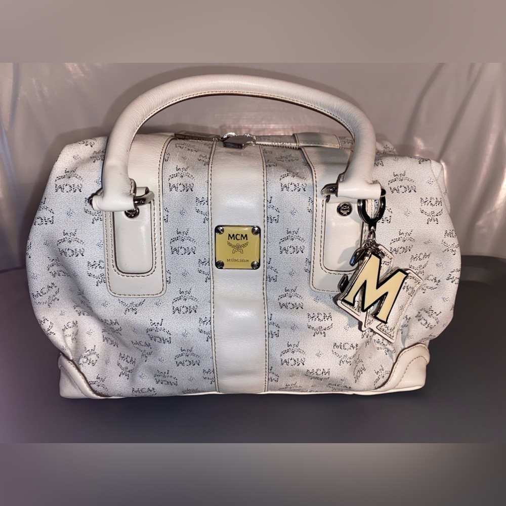 Authentic MCM white/dot matrix handbag.  Certificate of Authenticity included